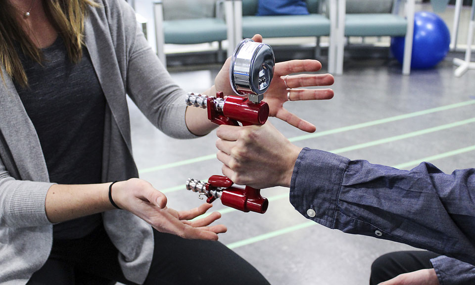 Grip strength machine at Surrey Neuroplasticity Clinic